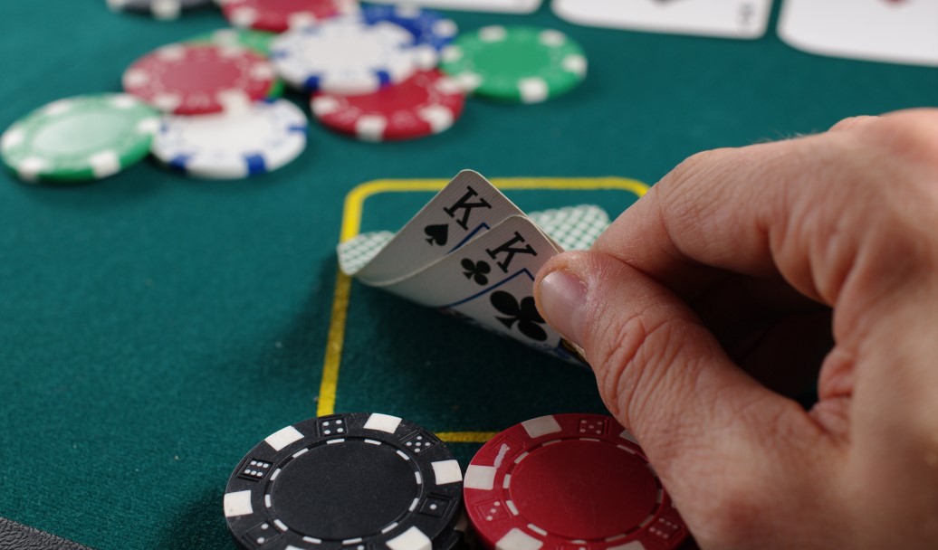 poker hand and poker chips
