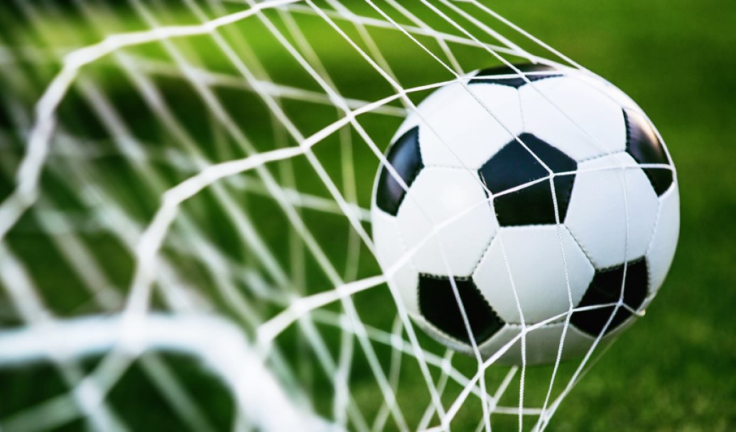 This is an image of a soccer ball in the back of the net